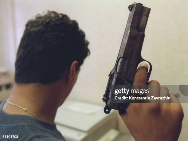 Russian Policeman Holds A Hand-Made Gun. The Gun Was Confiscated By Yekaterinburg Police.