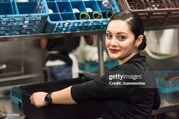 young hispanic female kitchen worker - immigrants bildbanksfoton och bilder