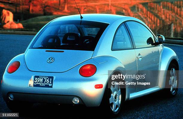 The New 1999 Beetle From Volkswagon. The Trademark Beetle Body Shape Is Immediately Recognizable, Though It Shares No Parts With The Old Beetle. It's...