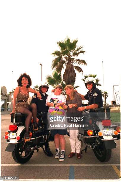 Birds Of A Feather Girls Sharon And Tracy With LAPD bike Officers and an unidentified female Body Builder at Venice Beach in 1992