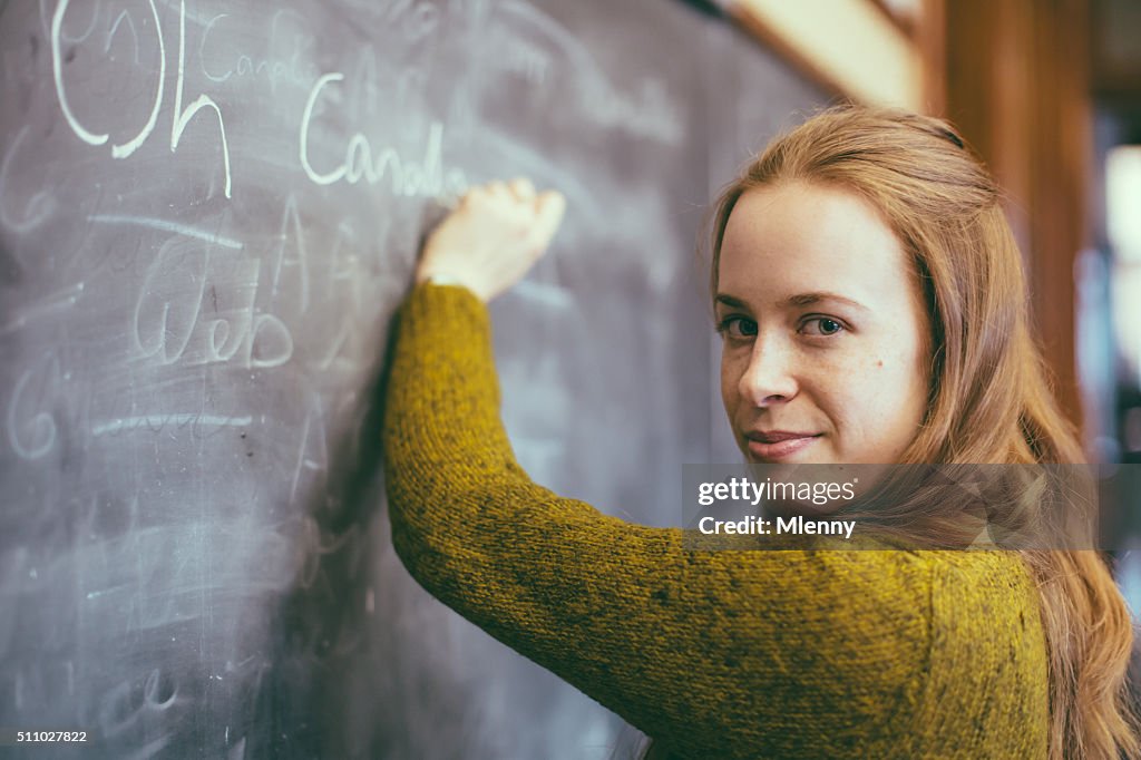 O Canadá, Himno, mujer estudiante escribir en pizarra