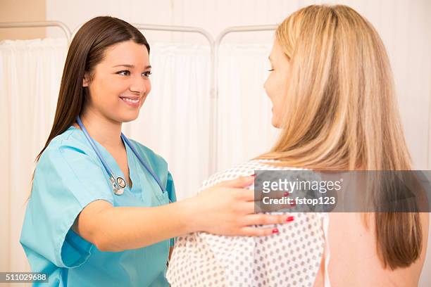 healthcare: woman receives annual breast exam. - cancer 2016 stock pictures, royalty-free photos & images