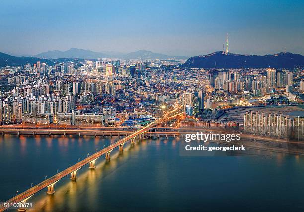 seoul cityscape at dusk - han gang stockfoto's en -beelden