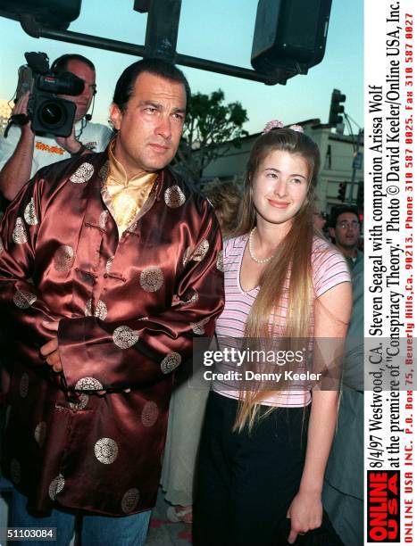 Westwood,Ca. Steven Seagal With Companion Arissa Wolf At The Premiere Of "Conspiracy Theory."