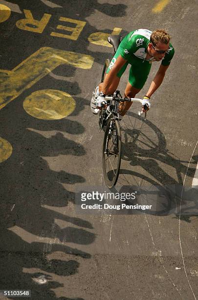 Christophe Moreau of France and riding for Credit Agricole climbs Alpe d'Huez as he finished 20th in the individual time trial during stage 16 of the...