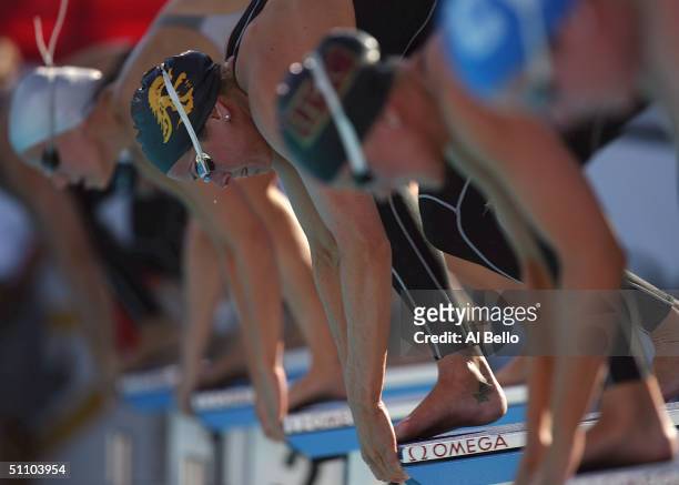 Dana Vollmer, Lindsey Benko and Kaitlin Sandeno ready to push off the blocks before swimming the Womens 200 meter freestyle final during the US...