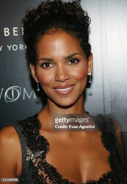 Actress Halle Berry attends a "Catwoman" - inspired party on July 21, 2004 at Henri Bendel, in New York City.