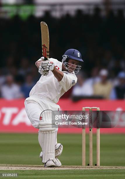 Andrew Strauss of England hits out during day 1 of the England v West Indies 1st Npower Test match at Lords Cricket Ground on July 22 2004 in London,...