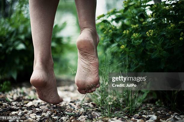 jump - bare feet stock pictures, royalty-free photos & images