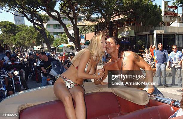Stripper Eva Henger appears at the 10th Bikers Bikini Benefit at Cafe degli Artisti July 18, 2004 in Cesenatico, Italy.