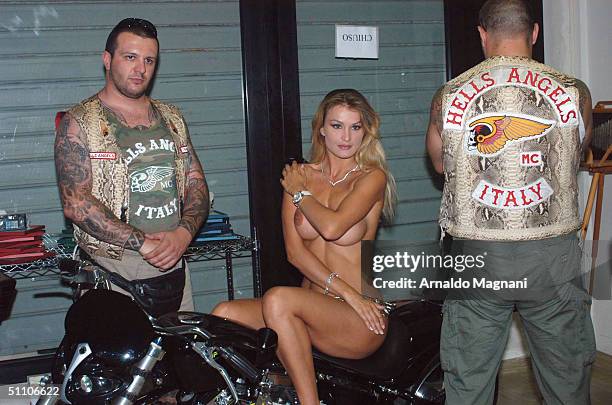 Stripper Eva Henger appears at the 10th Bikers Bikini Benefit at Cafe degli Artisti July 18, 2004 in Cesenatico, Italy.