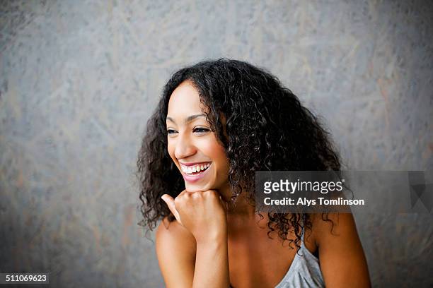image of a woman smiling in a cafe - mid adult women stock pictures, royalty-free photos & images