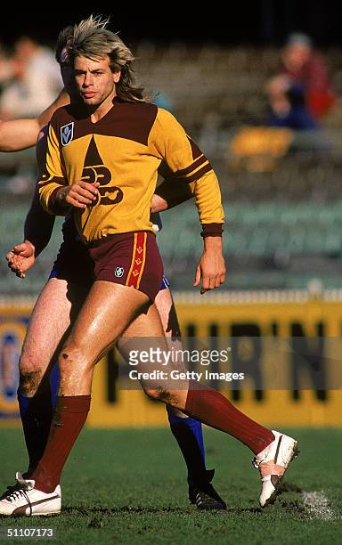 Warwick Capper of the Brisbane Bears in action during a AFL match held at the Melbourne Cricket Bround, 1988 in Melbourne, Australia.