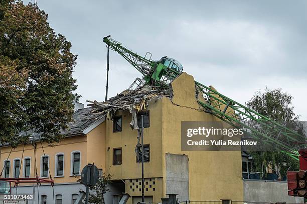 Cologne,Germany, 29 August,2014: a 40 meter tall crane falls on house into Cologne-Marienburg