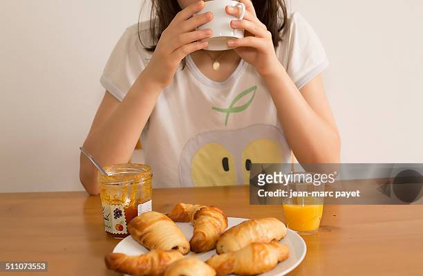 Traditional french breakfast with croissant, pain au chocolat, orange juice and coffre