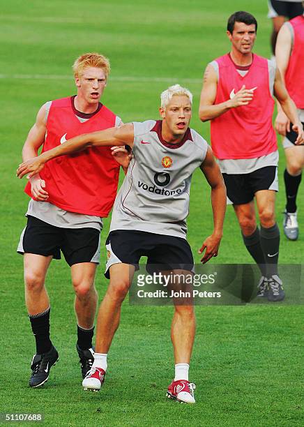 Alan Smith and Paul McShane of Manchester United in action during a training session on July 22 2004 at the start of their 2004 USA Tour, which will...