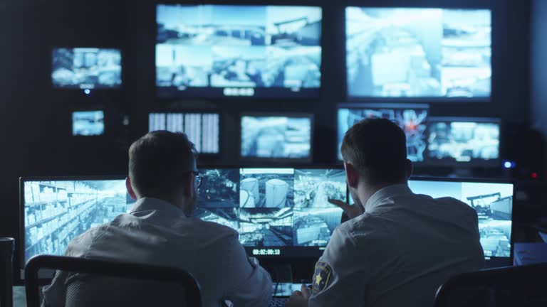 https://media.gettyimages.com/id/511093032/video/two-security-officers-noticed-a-trespasser-on-a-surveillance-computer-screen-in-a-dark.jpg?b=1&s=640x640&k=20&c=097MdNevA15mSGBkFOzQbmvutDjq-ymh3jzwGDegGgU=