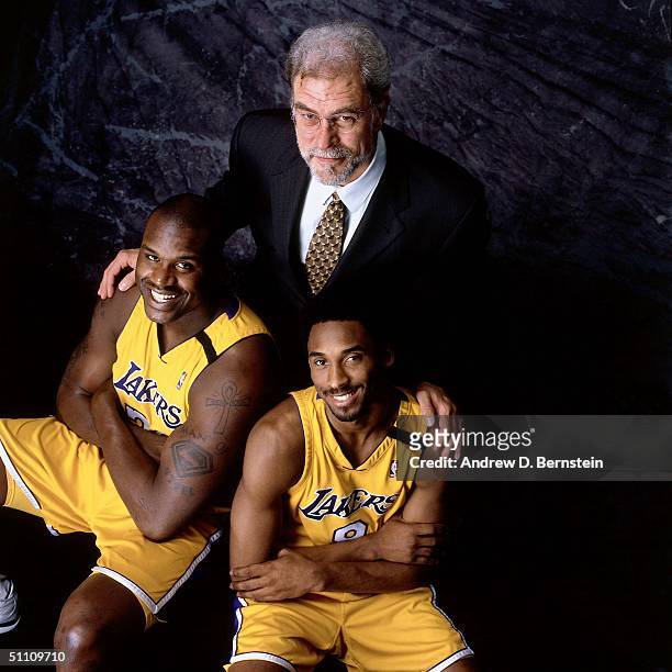 Head Coach Phil Jackson, center, Shaquille O'Neal and Kobe Bryant of the Los Angeles Lakers pose for a portrait at the Staples Center circa 2000 in...
