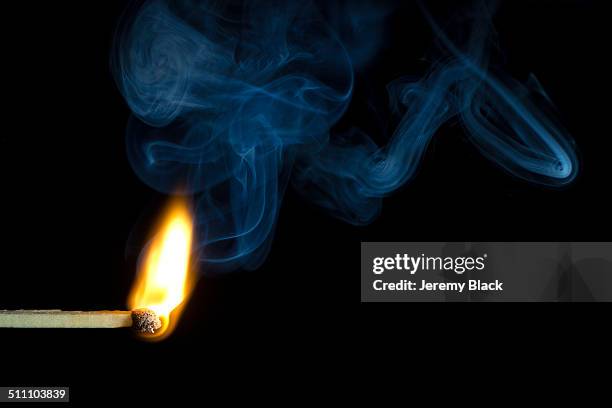 burning match and smoke - matchstick stock pictures, royalty-free photos & images