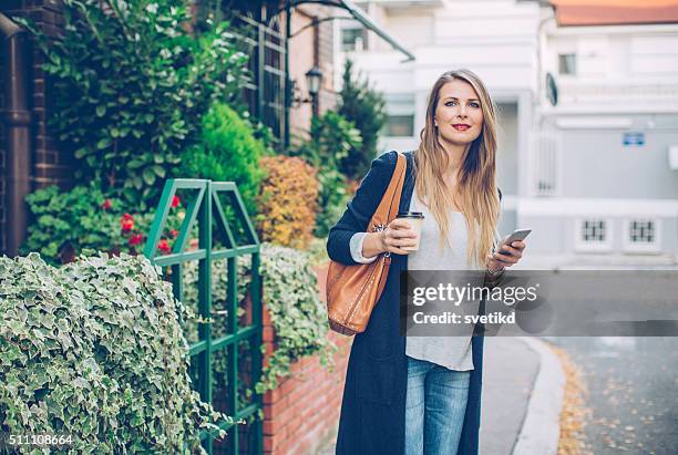 coffee and connectivity - waiting outside stock pictures, royalty-free photos & images