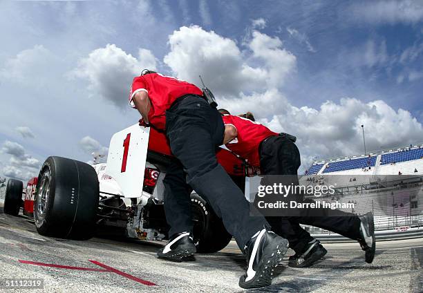 Scott Dixon is pushed out of the pits in the Target Chip Ganassi Racing Toyota GForce during practice for the Indy Racing League IndyCar Series...