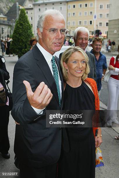 Bayern Muenchen president Franz Beckenbauer and his wife Heidrun Burmester arrive for the first performance of "Jedermann" at the 2004 Salzburg Music...