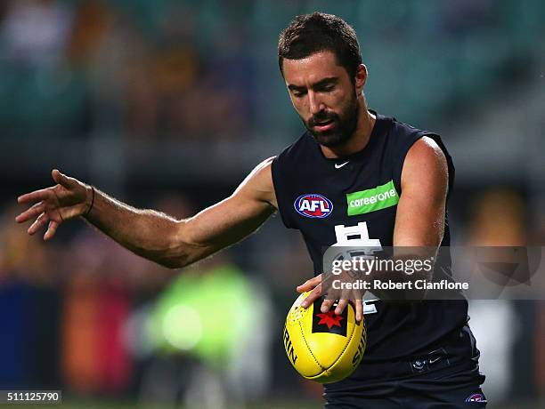 Kade Simpson of the Blues controls the ball during the 2016 AFL NAB Challenge match between the Hawthorn Hawks and the Carlton Blues at Aurora...