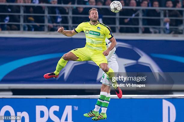 Laurent Depoitre of KAA Gent, Sebastian Jung of VFL Wolfsburg during the UEFA Europa League round of 16 match between KAA Gent and VfL Wolfsburg on...