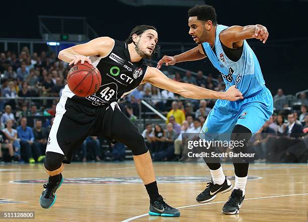 Chris Goulding of Melbourne United controls the ball as Corey Webster of the New Zealand Breakers defends during the NBL Semi Final match between...