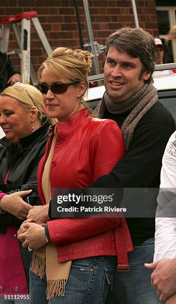 Television Chanel 9 CEO David Gyngell holds in his arms girlfriend reporter Leila McKinnon at the auction of the two last units of the second series...