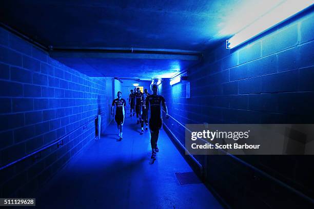 Melbourne United players leave their changing rooms and walk to the entrance of the court during the NBL Semi Final match between Melbourne United...