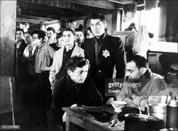 Photo prise en 1942 de juifs internés dans le camp de Drancy avant d'être déportés vers les camps d'extermination nazis. Picture taken in 1942 shows...