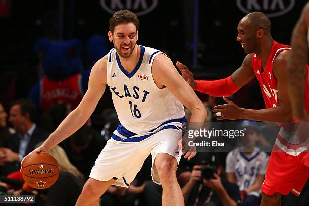 Pau Gasol of the Chicago Bulls and the Eastern Conference handles the ball against Kobe Bryant of the Los Angeles Lakers and the Western Conference...