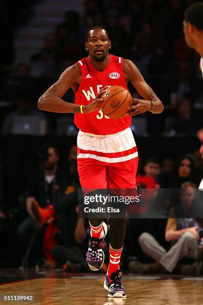 Kevin Durant of the Oklahoma City Thunder and the Western Conference passes in the second half against the Eastern Conference during the NBA All-Star...