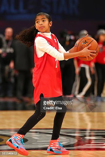 Gianna Bryant, daughter of Kobe Bryant of the Los Angeles Lakers and the Western Conference, handles the ball during warm ups before the NBA All-Star...