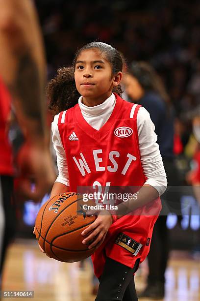 Gianna Bryant, daughter of Kobe Bryant of the Los Angeles Lakers and the Western Conference, handles the ball during warm ups before the NBA All-Star...