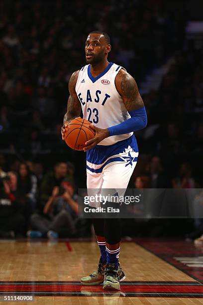 LeBron James of the Cleveland Cavaliers and the Eastern Conference handles the ball against the Western Conference in the first half during the NBA...