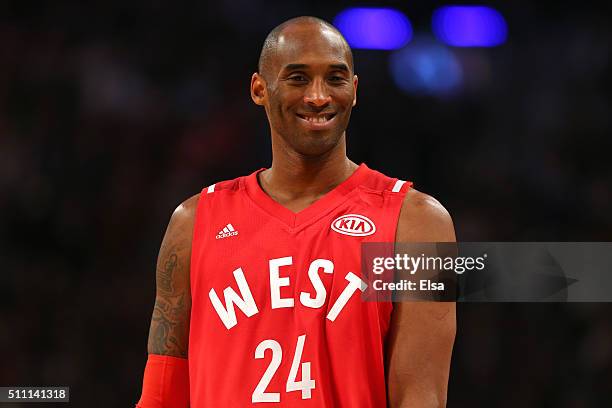 Kobe Bryant of the Los Angeles Lakers and the Western Conference smiles in the first half against the Eastern Conference during the NBA All-Star Game...