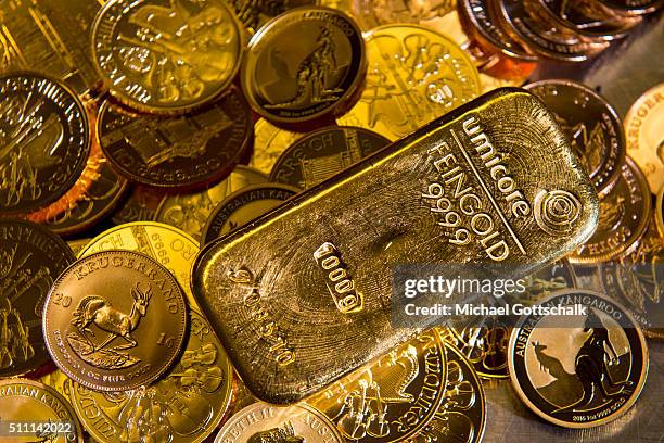 Muenchen, Germany Gold bar and Gold Coins in the safe of Pro Aurum Gold trading house on February 16, 2016 in Muenchen, Germany.