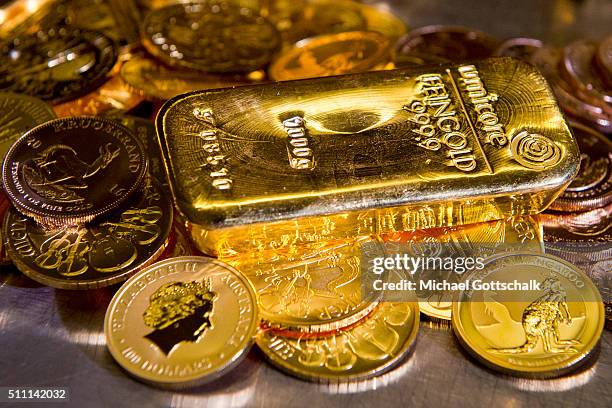 Muenchen, Germany Gold bar and Gold Coins in the safe of Pro Aurum Gold trading house on February 16, 2016 in Muenchen, Germany.