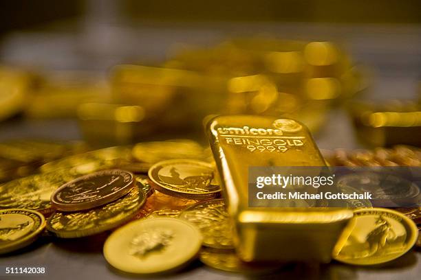 Muenchen, Germany Gold bar and Gold Coins in the safe of Pro Aurum Gold trading house on February 16, 2016 in Muenchen, Germany.