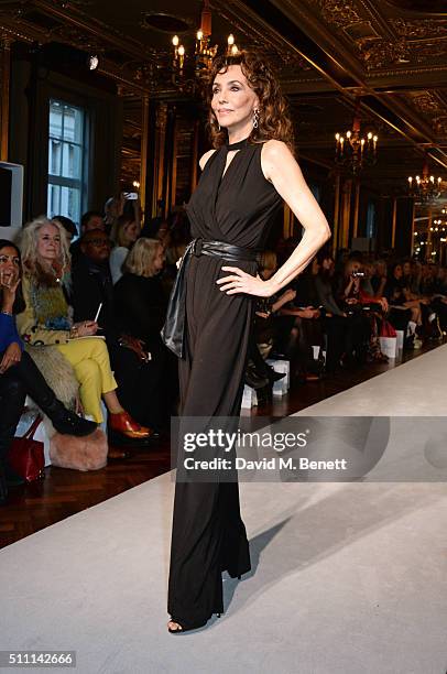 Marie Helvin walks the runway at the first Fifty Plus Fashion Week hosted by JD Williams at Cafe Royal on February 18, 2016 in London, England.