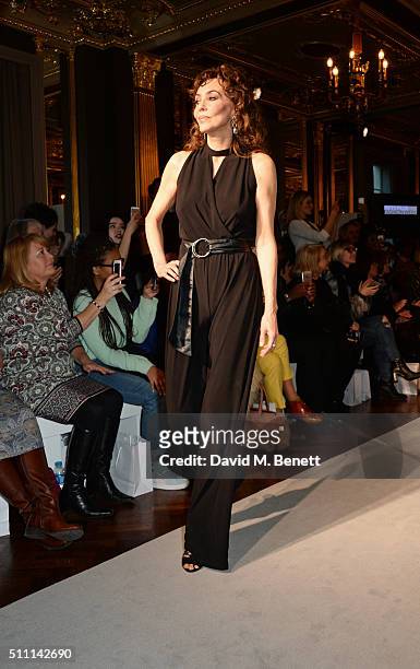 Marie Helvin walks the runway at the first Fifty Plus Fashion Week hosted by JD Williams at Cafe Royal on February 18, 2016 in London, England.