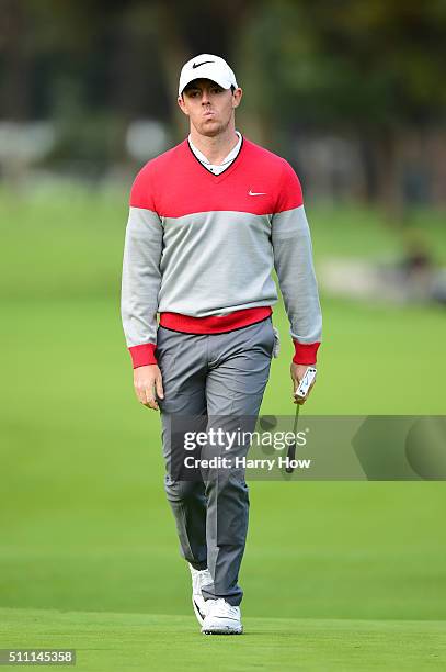Rory McIlroy of Northern Ireland reacts to a missed butt on the 11th hole during round one of the Northern Trust Open at Riviera Country Club on...