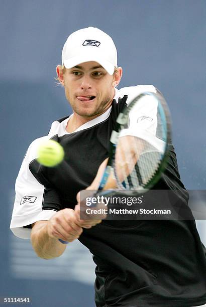 Andy Roddick returns a shot to Nicolas Kiefer of Germany during the finals of the RCA Championships July 25, 2004 at the Indianapolis Tennis Center...