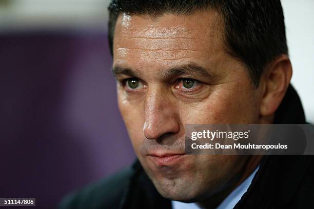 Besnik Hasi the head coach of Anderlecht looks on prior to the UEFA Europa League round of 32 first leg match between Anderlecht and Olympiakos FC at...