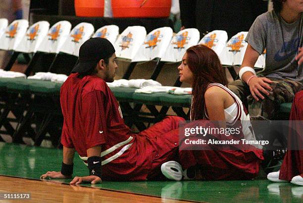 Actors Wilmer Valderrama and Lindsay Lohan share a moment at NSYNC Challenge For The Children Celebrity Basketball Game July 25, 2004 at Office Depot...