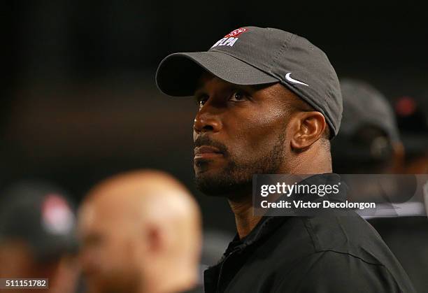 Running back coach Priest Holmes of the National Team looks on from the sideline during the NFLPA Collegiate Bowl between the American Team and the...