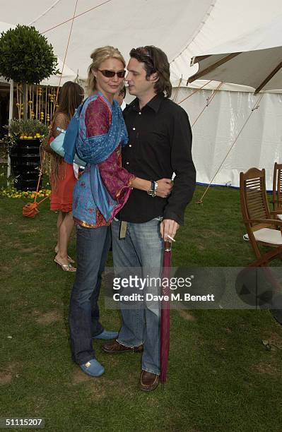 Model Jodie Kidd and internet entrepreneur partner Aidan Butler attends the Cartier International Day held at Guards Polo Club, Windsor Great Park on...