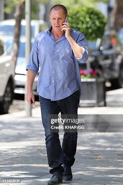 Larry Emdur on his phone on February 18, 2016 in Sydney, Australia.